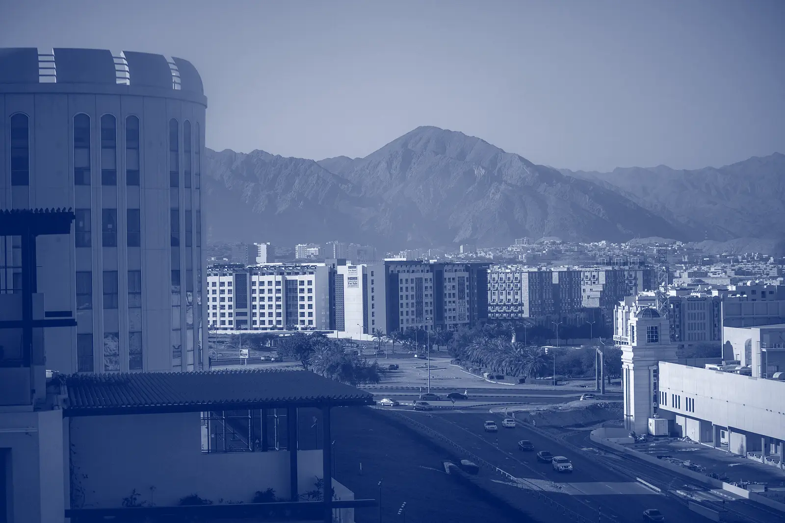 Muscat, Oman, with the Hajar mountains behind the city